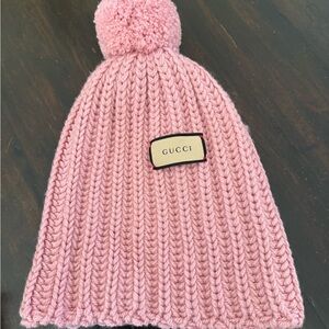 Gucci Kids Pink Knit Beanie with Pom-Pom. I only wore it one time .